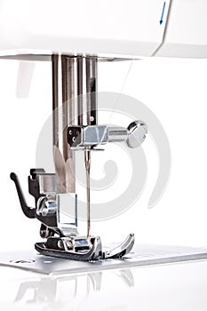 Sewing machine needle plate macro