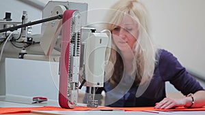 Sewing machine processing the cloth