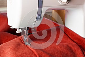 Sewing machine and red fabric