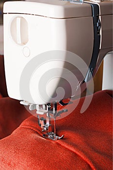 Sewing machine and red fabric