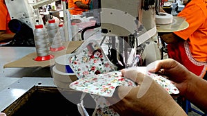 Sewing machine stitching on textile