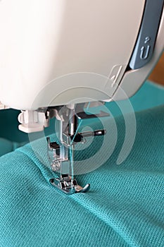 Sewing machine and turquoise fabric