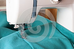 Sewing machine and turquoise fabric