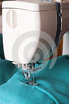 Sewing machine and turquoise fabric