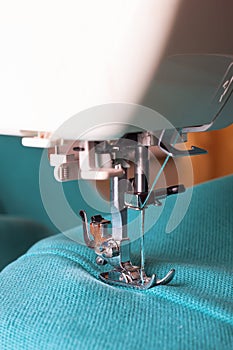 Sewing machine and turquoise fabric