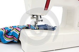 The sewing-machine on a white background
