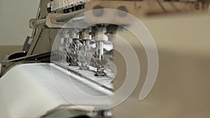 Sewing machines. Seamstress sews clothes. Sewing factory. Sewing company. Seamstress.