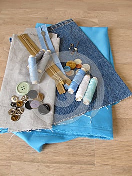 Sewing material with fabric, twine and buttons