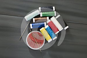 Sewing needle and colored spool yarns, multicolored spool yarns, sewing and sewing needles, scissors and scissors, tailoring mater