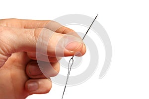 Sewing needle in hand