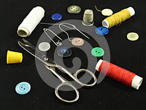 Sewing Needle thread scissors thimble tailor buttons photo