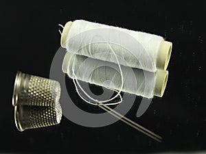 Sewing Needle thread scissors thimble tailor buttons photo
