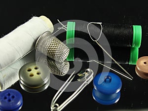 Sewing Needle thread scissors thimble tailor buttons photo