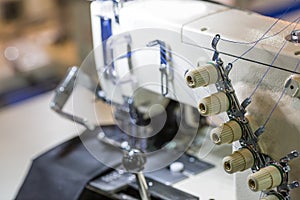 Sewing or overlock machine closeup, cloth industry