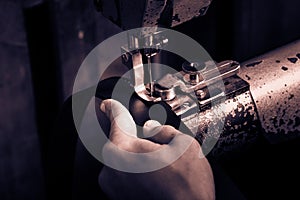 Sewing process of the leather belt.