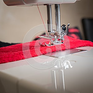 Sewing process in the phase of overstitching close up