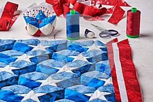 Sewing of quilt with stylized elements of American flag