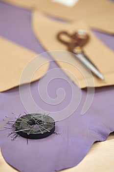 Sewing scissors, fabric and pins for sewing and needlework