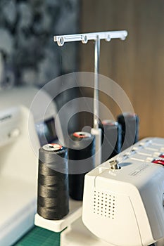 Sewing, stitching and overlocking on a machine at home