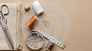 Sewing and Tailoring Essentials Flat Lay on Beige Background