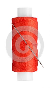 Sewing thread and needle closeup