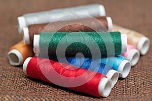 Sewing thread, spools of thread in different colors
