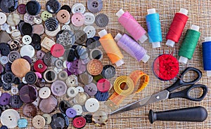Sewing threads, buttons for clothes and other accessories for sewing and needlework. Ð¡oncept of sewing accessories