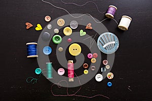 sewing threads, buttons, needles, art and handswork for children