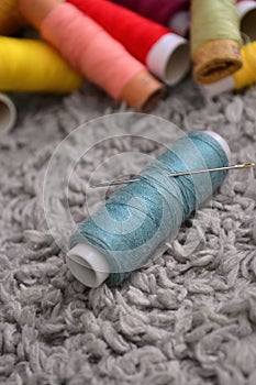 sewing threads and a needle