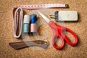 Sewing tool on the cork board