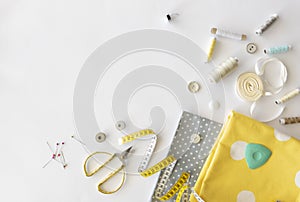 Sewing tools frame. A tools set for sewing on a white table. Top view with copy space