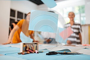 Sewing tools lying on the cutting table