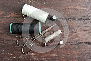 Sewing tools on the old wood