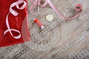 Sewing tools and sewing supplies accessories sewing on wooden table.