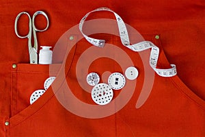 Sewing utensils on red