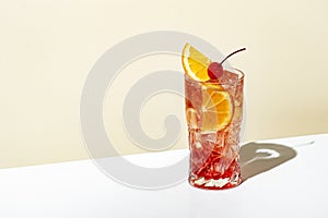 Sex on the beach - popular alcoholic cocktail drink with vodka, peach liqueur, orange and cranberry juice, lemon and ice,