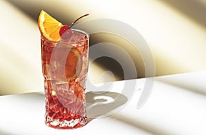 Sex on the beach - popular alcoholic cocktail drink with vodka, peach liqueur, orange and cranberry juice, lemon and ice,
