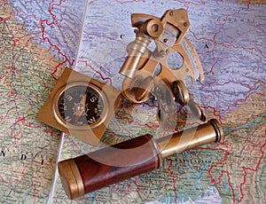 Sextant, atlas and compass