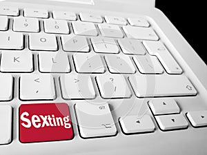 Sexting keyboard key on white keyboard photo