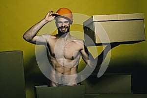 Sexuality and building concept. Guy with naked torso