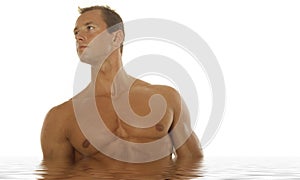 athletic man in water