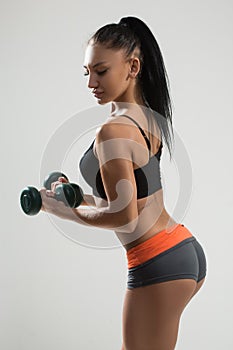 athletic woman with long hair. back