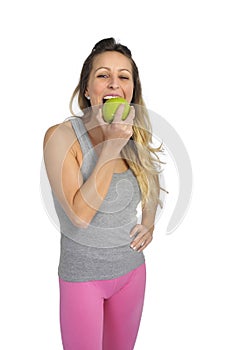 beautiful woman biting green apple fruit in healthy natural