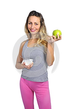 beautiful woman holding green apple fruit in healthy natural nutrition and fitness concept