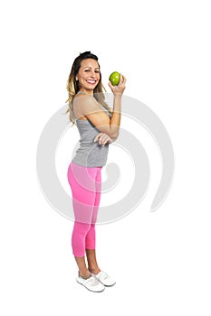 beautiful woman holding green apple fruit in healthy natural nutrition and fitness concept