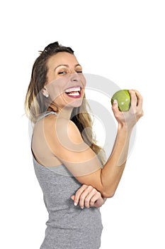 beautiful woman holding green apple fruit in healthy natural nutrition and fitness concept