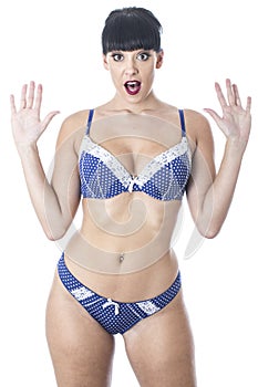 Beautiful Young Shocked Woman Wearing Navy Blue and White Lacy Lingerie