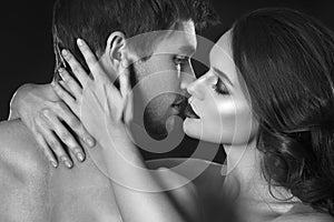 beauty couple. Kissing couple portrait. Sensual brunette woman in underwear with young lover, passionate couple