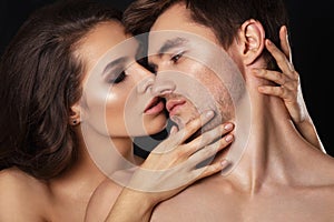 beauty couple.Kissing couple portrait.Sensual brunette woman in underwear with young lover, passionate couple