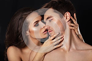 beauty couple.Kissing couple portrait.Sensual brunette woman in underwear with young lover, passionate couple